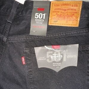 Levi’s 501 high waisted distressed raw hem black jean shorts Sz 30 NWT